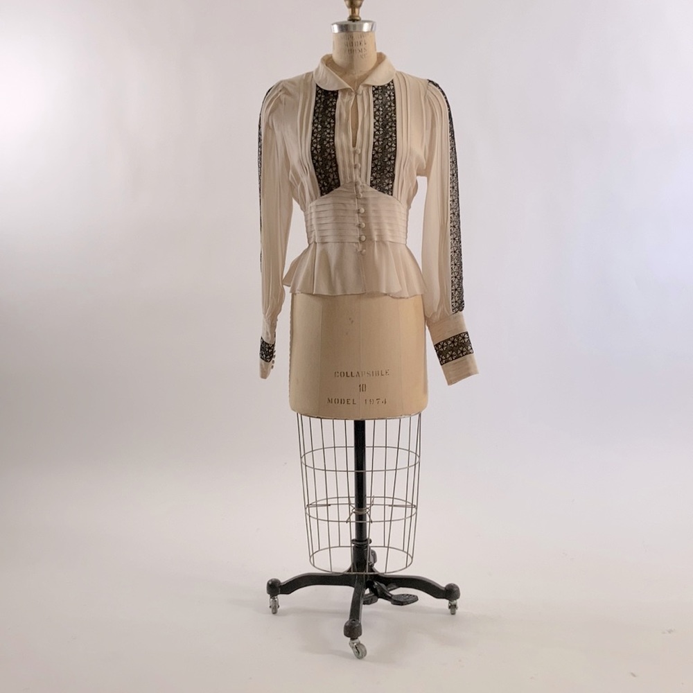 London peplum blouse with 27 covered buttons